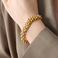 Pulsera gruesa recubrimiento PVD chapado en oro autentico 18K