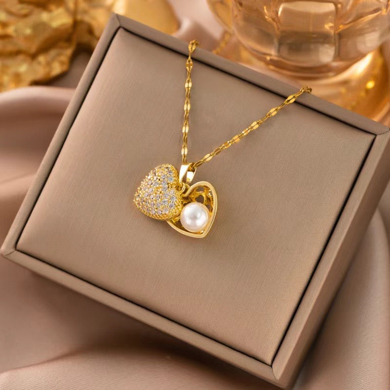 Cadena corazon abierto con perla adentro